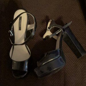 Black platform peeptoe heels